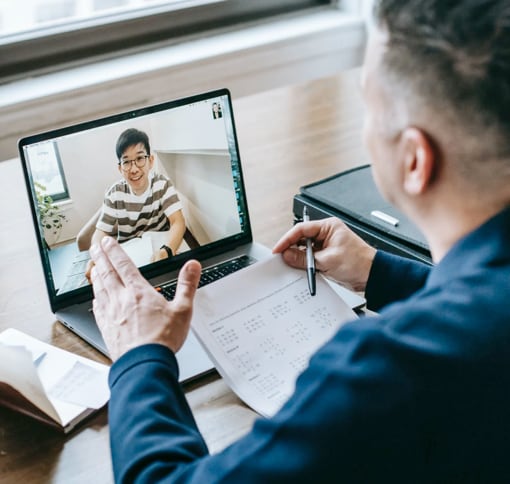 a man video chatting with his son